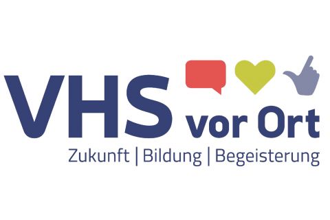 Mitarbeitende der VHS vor Ort ziehen um